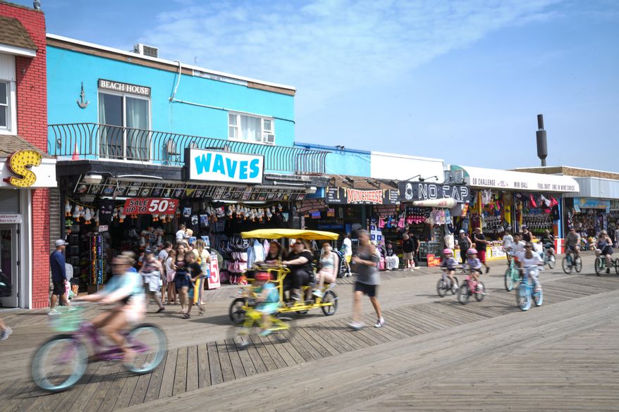 Small businesses line the boardwalk in Wildwood, N.J., on Aug. 9, 2024. (AP Photo/Matt Rourke, File)