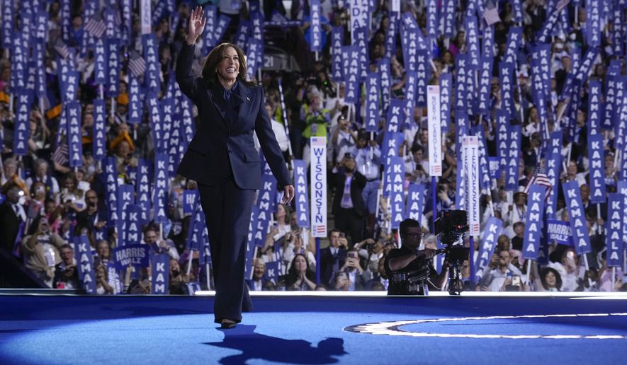 Democratic presidential nominee Vice President Kamala Harris arrives to speak on the final day of the Democratic National Convention, Thursday, Aug. 22, 2024, in Chicago. (AP Photo/Jacquelyn Martin)