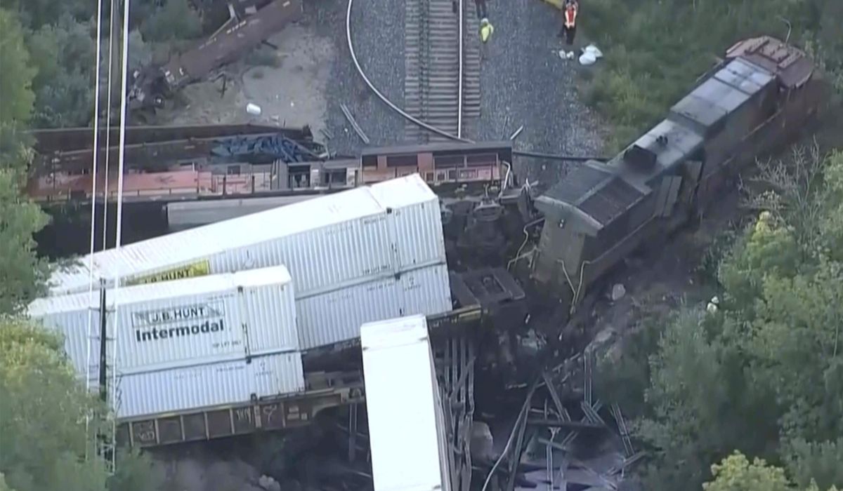 NextImg:2 freight trains collided in Colorado, damaging a bridge, spilling fuel and injuring 2 crew