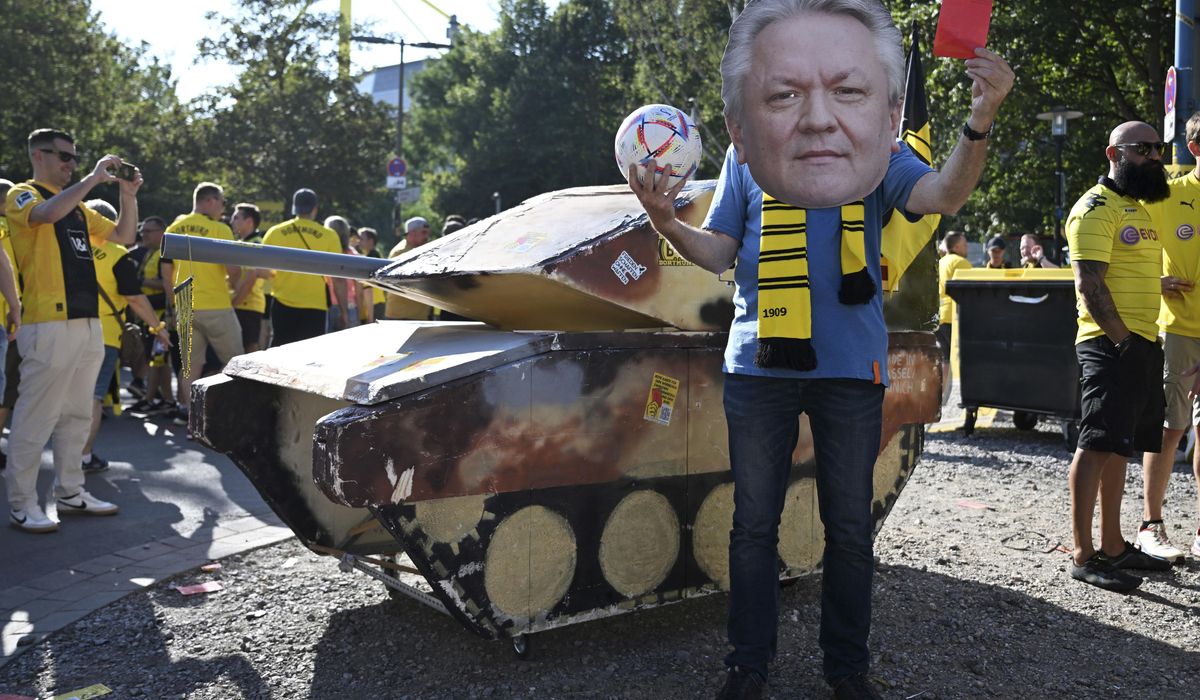 NextImg:Dummy tank outside Borussia Dortmund stadium as fans protest club’s deal with arms manufacturer