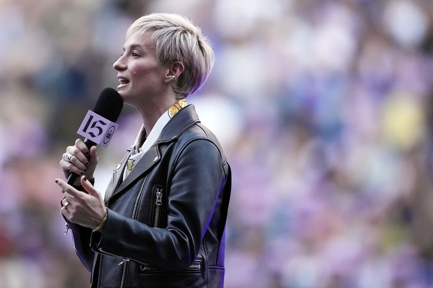 Former Seattle Reign forward Megan Rapinoe speaks during a ceremony to retire her jersey before an NWSL soccer match against the North Carolina Courage, Sunday, Aug. 25, 2024, in Seattle. (AP Photo/Lindsey Wasson)