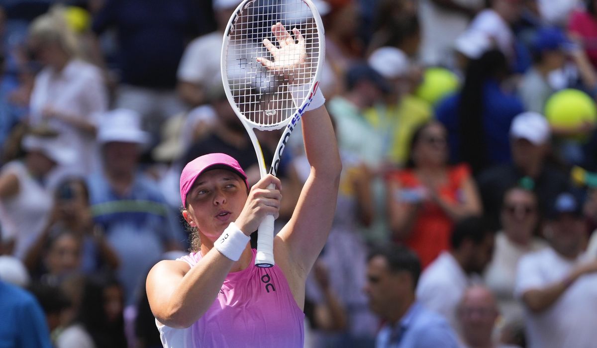 NextImg:No. 1 Swiatek survives tough test, Osaka wins in her return to U.S. Open