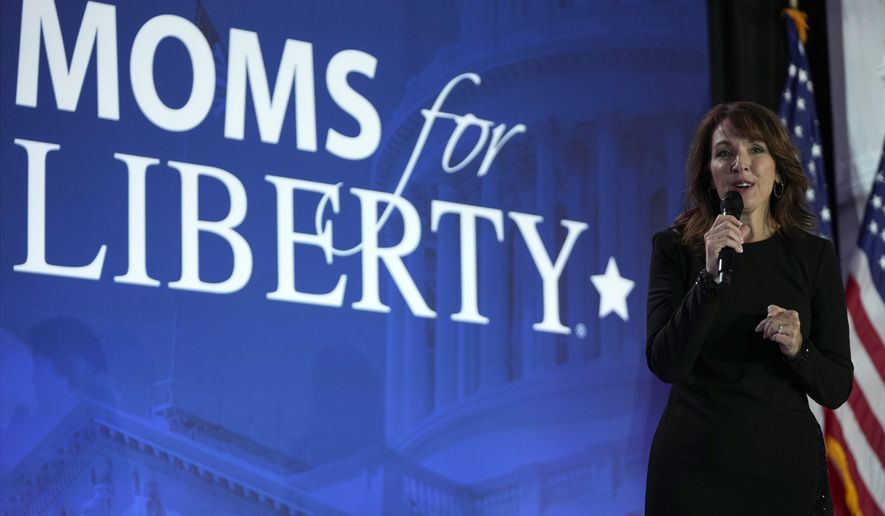 Moms for Liberty co-founder Tina Descovich speaks before Republican presidential nominee former President Donald Trump at the Moms for Liberty annual convention in Washington, Friday, Aug. 30, 2024. (AP Photo/Mark Schiefelbein)