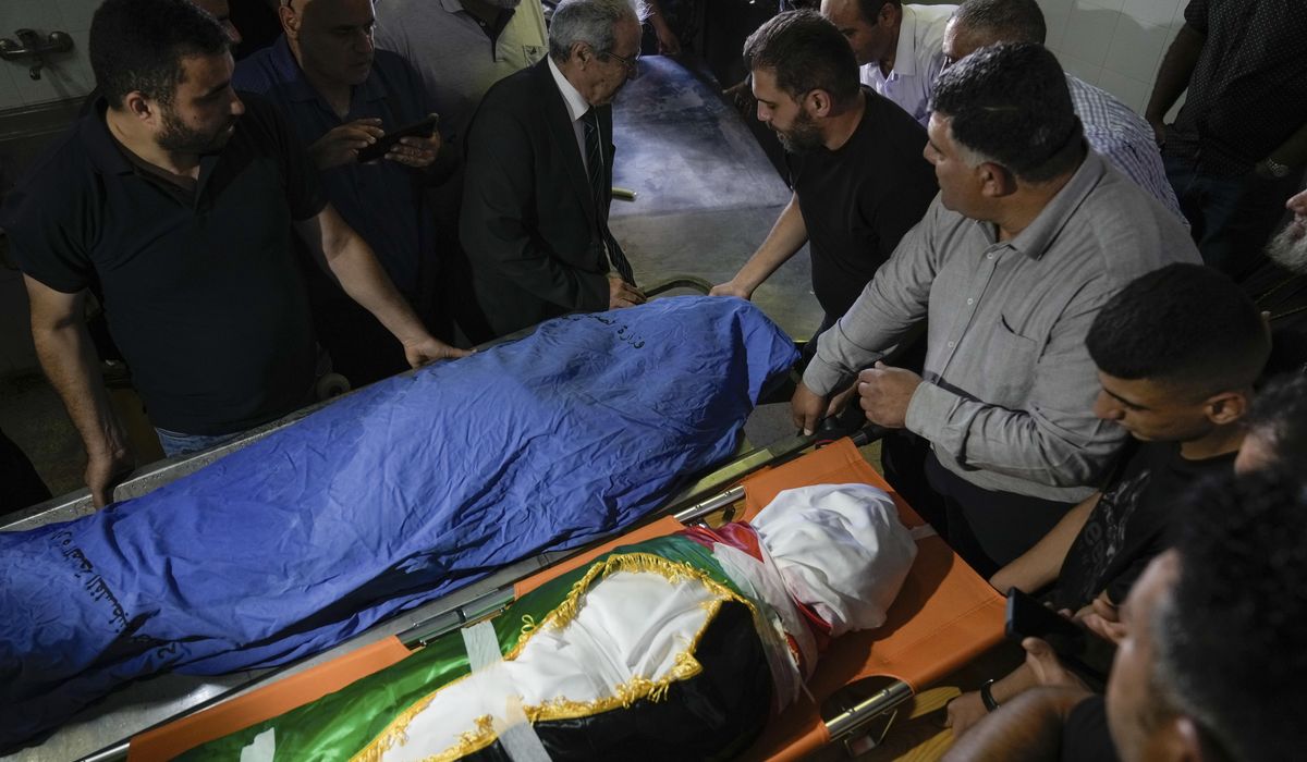 NextImg:Israeli strikes kill more than a dozen in Gaza as health workers press on with polio vaccines