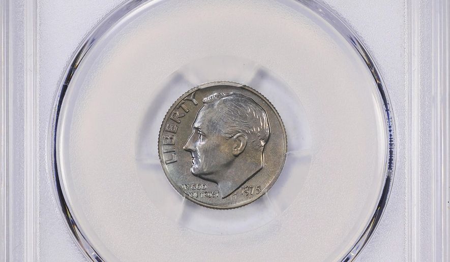 This undated image provided by GreatCollections shows a 1975 proof set dime mistakenly made without the San Francisco Mint’s letter S mintmark. (GreatCollections via AP)