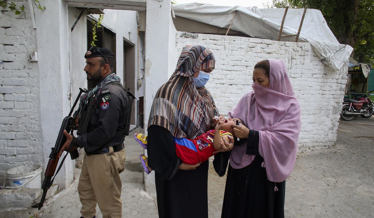 NextImg:Gunmen on motorcycles kill a polio worker during a vaccination campaign in Pakistan