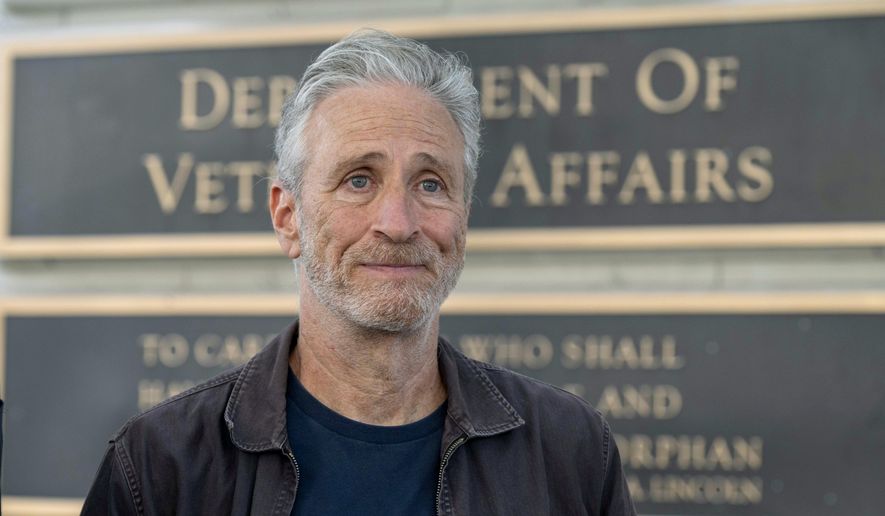Jon Stewart takes part in an interview outside the Department of Veterans Affairs, July 26, 2024, in Washington. (AP Photo/Kevin Wolf, File)