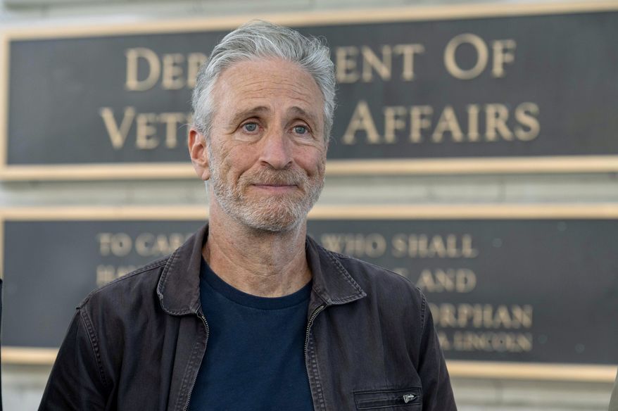Jon Stewart takes part in an interview outside the Department of Veterans Affairs, July 26, 2024, in Washington. (AP Photo/Kevin Wolf, File)