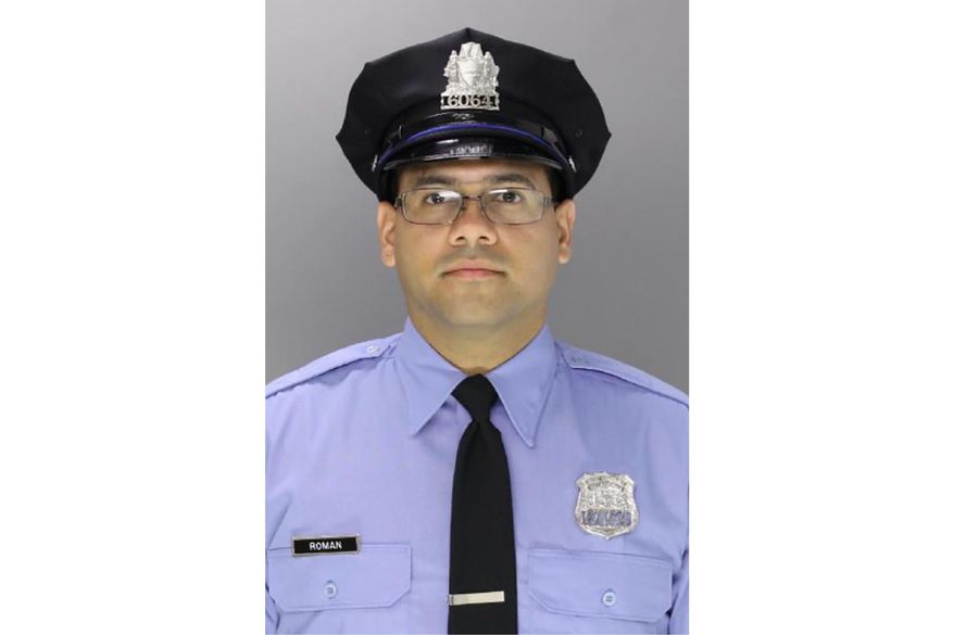 This undated photo provided by the Philadelphia Police Department shows Philadelphia Police Officer Jaime Roman. (Philadelphia Police Department via AP)