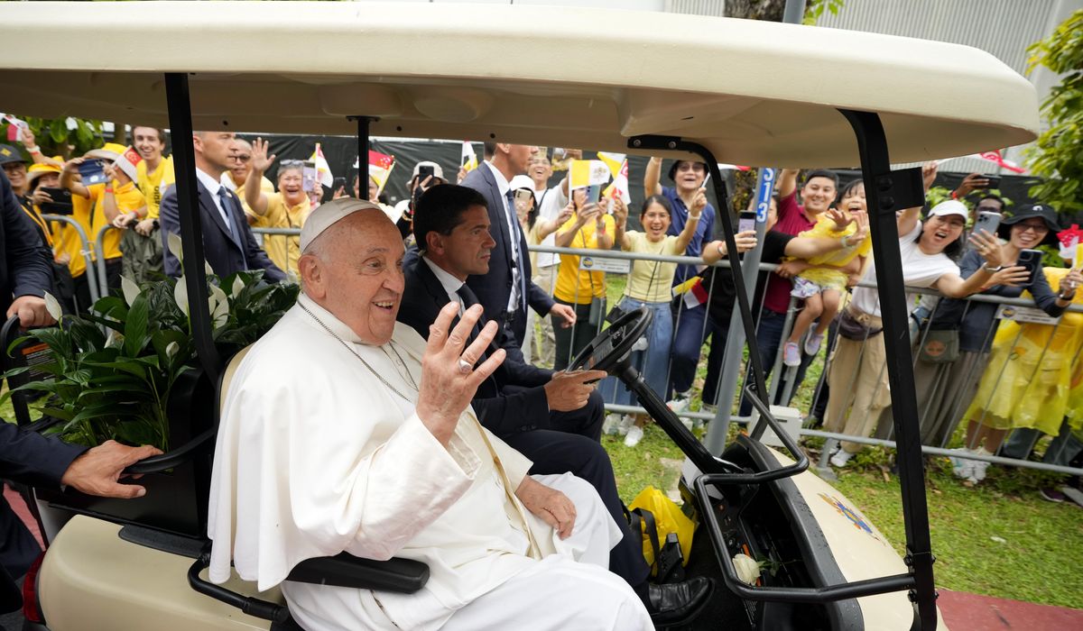 NextImg:Pope lands in economic power Singapore after a joyous visit to impoverished, devout East Timor