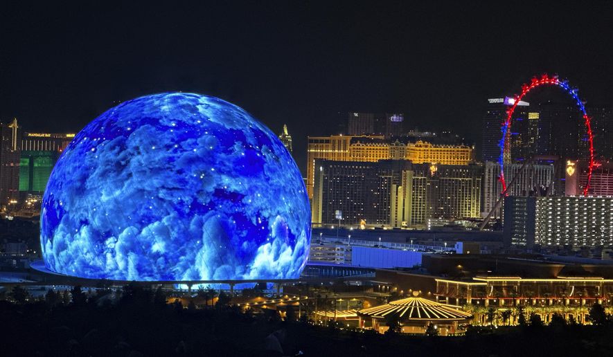 The MSG Sphere illuminates the Las Vegas skyline, as seen from the Metropolis, on July 4, 2023. (L.E. Baskow/Las Vegas Review-Journal via AP) **FILE**