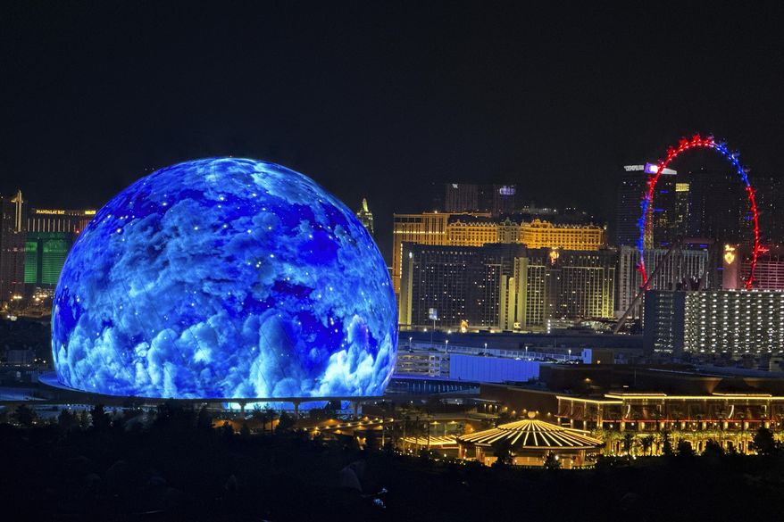 The MSG Sphere illuminates the Las Vegas skyline, as seen from the Metropolis, on July 4, 2023. (L.E. Baskow/Las Vegas Review-Journal via AP) **FILE**