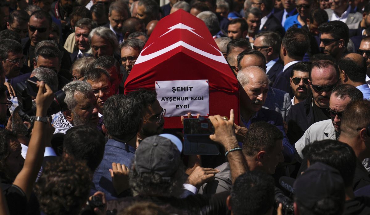 NextImg:Israel strikes Gaza as an American activist killed by Israeli fire is buried