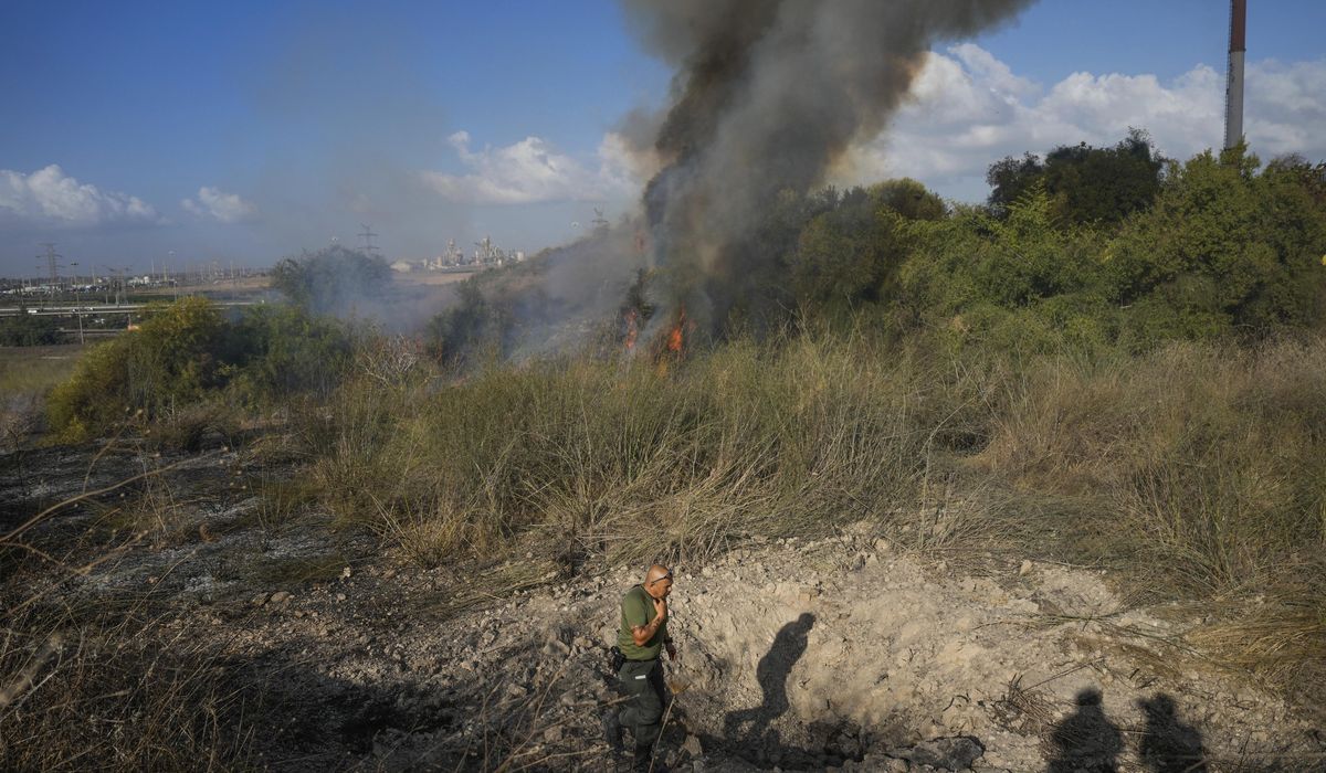 NextImg:A missile fired by Yemen’s rebels lands in Israel and triggers sirens at international airport
