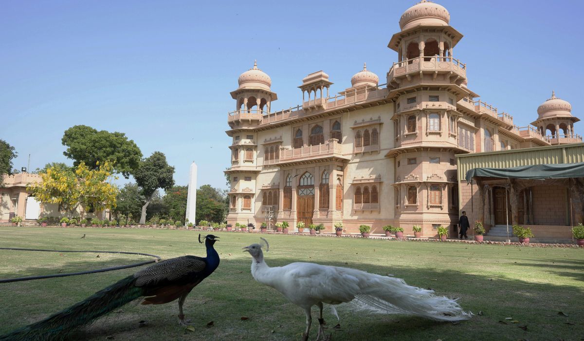 NextImg:Traces of this Pakistani megacity’s past are vanishing, but one flamboyant pink palace endures