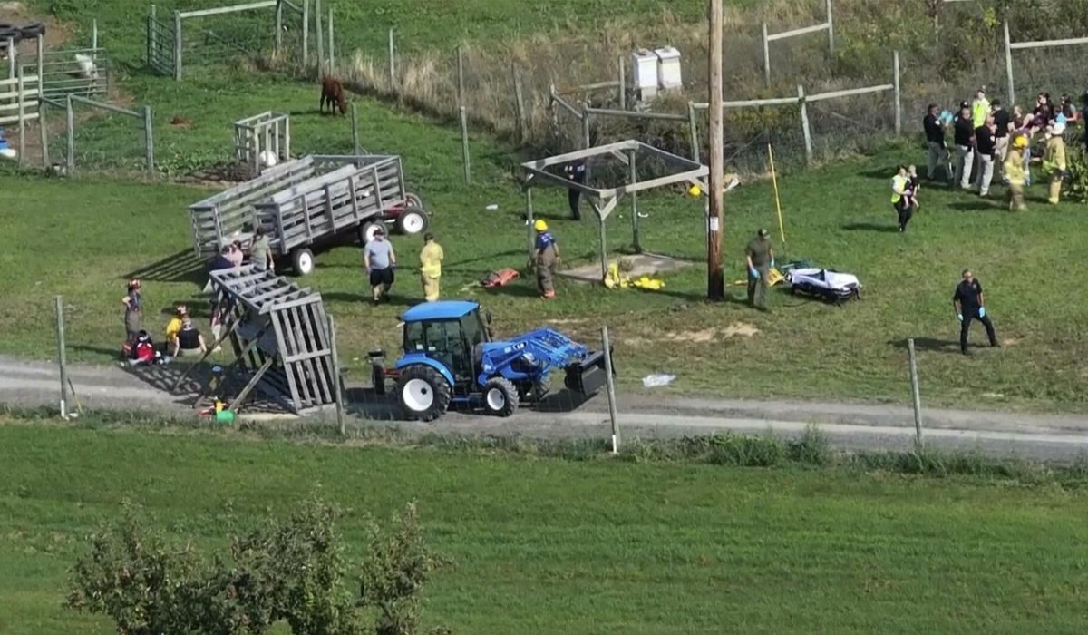 NextImg:Wagon rolls over at Wisconsin apple orchard, injuring about 25 children and adults