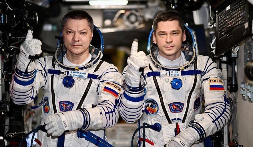 In this undated photo released by Roscosmos space corporation, Russians Oleg Kononenko and Nikolai Chub are shown aboard the International Space Station on Friday, Sept. 20, 2024. They set the record for the longest continuous presence on the ISS, more than 370 days. (Roscosmos space corporation via AP)