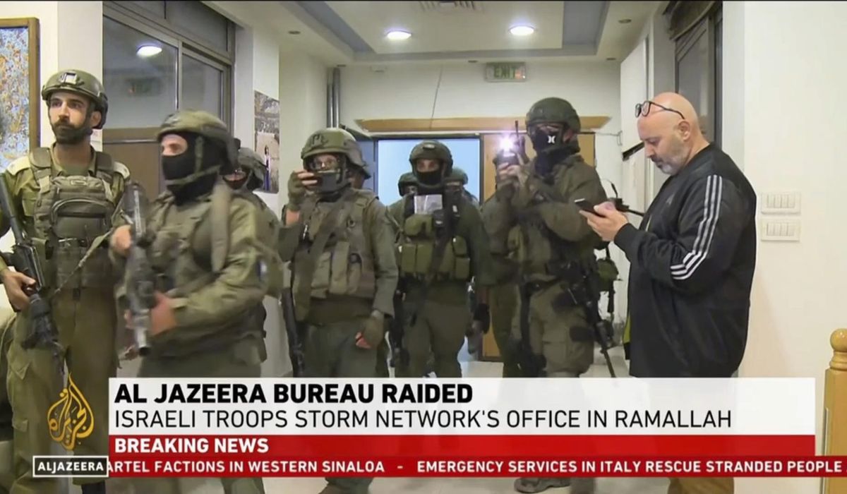 NextImg:Israel raids and shuts down Al Jazeera’s bureau in Ramallah in the West Bank