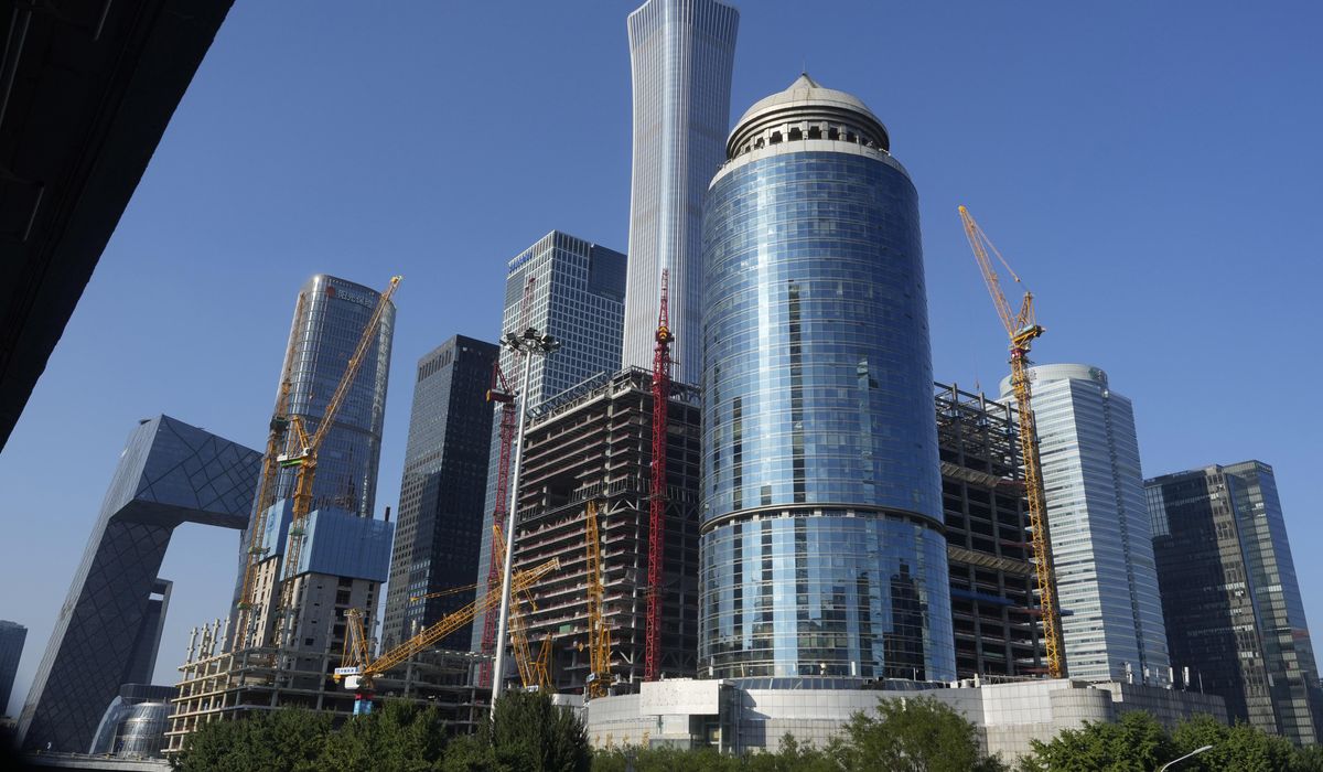 NextImg:China cuts rates, rolls out other moves to help the slowing economy
