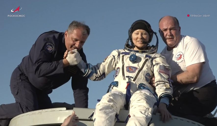 In this photo taken from video released by Roscosmos space corporation, rescue team members help NASA astronaut Tracy Dyson to leave the capsule shortly after the landing of the Russian Soyuz MS-25 space capsule carrying the NASA astronaut Tracy Dyson and the Roscosmos cosmonauts Oleg Kononenko and Nikolai Chub, south-east of the Kazakh town of Zhezkazgan, Kazakhstan, Monday, Sept. 23, 2024. (Roscosmos space corporation via AP)