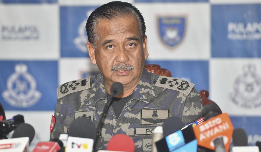 Malaysia Inspectors-General of Police Razarudin Husain speaks during a press conference in Kuala Lumpur, Monday, Sept. 23, 2024. (AP Photo)