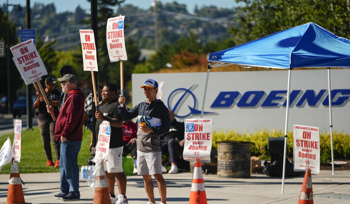 NextImg:Union leader calls on Boeing CEO to come to bargaining table after health care cut