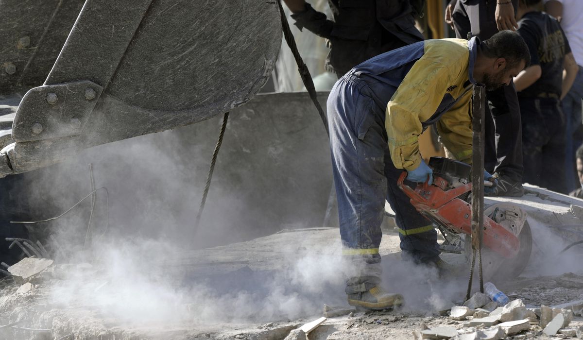 NextImg:Lebanese officials say an Israeli strike killed 23 Syrian workers and family members in Lebanon