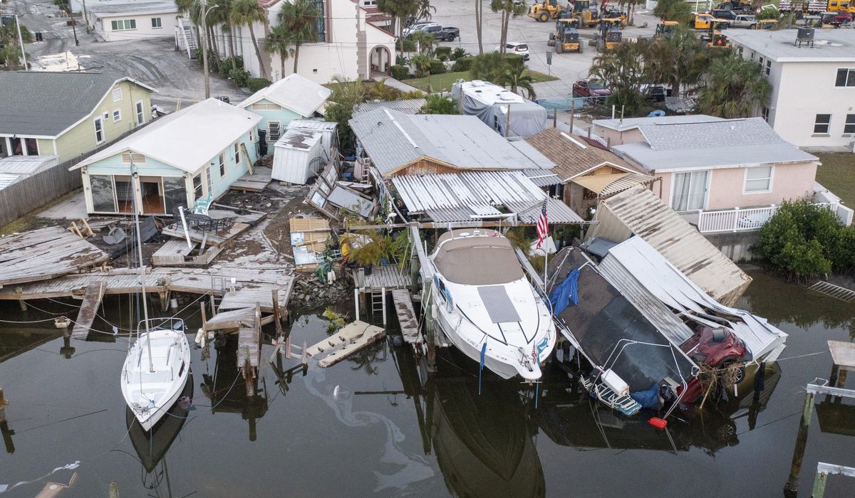 NextImg:Supplies rushed to communities isolated by Helene as death toll rises to nearly 100