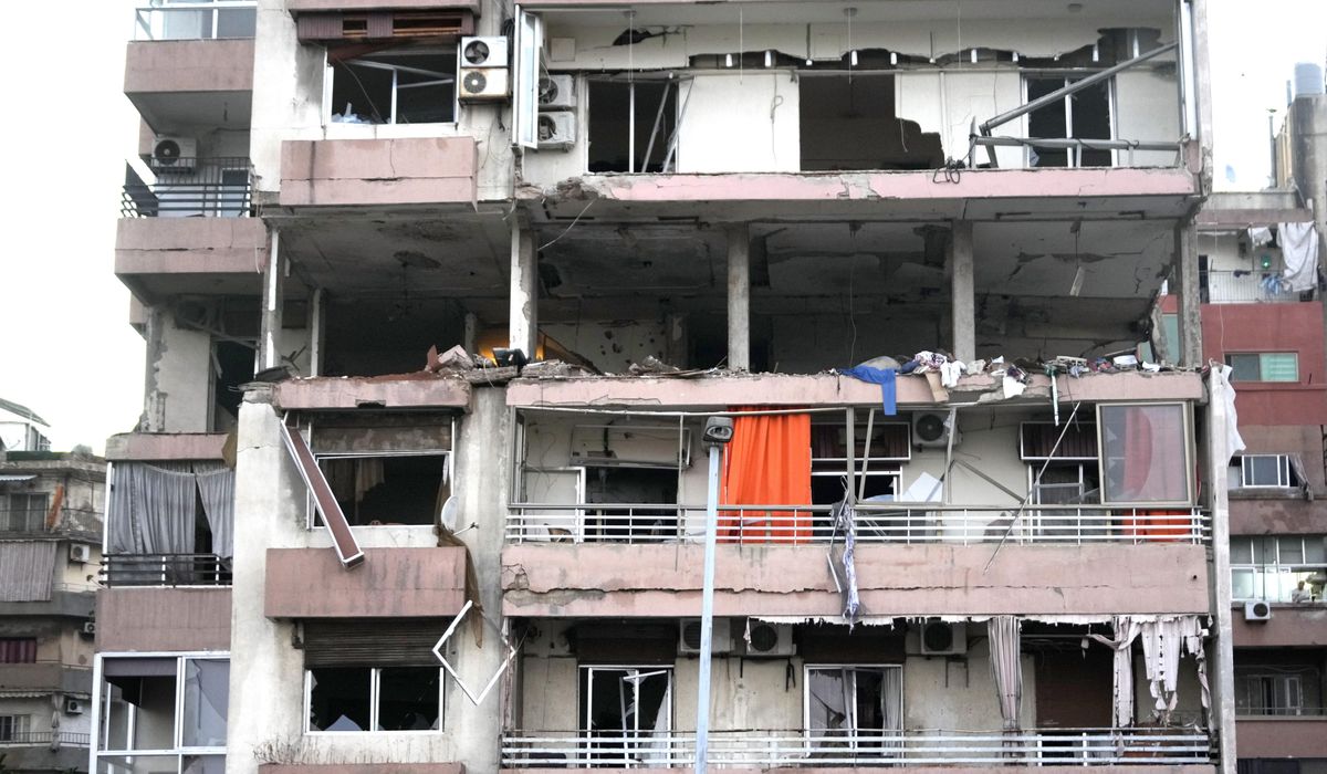NextImg:Israeli strike hits apartment building in central Beirut