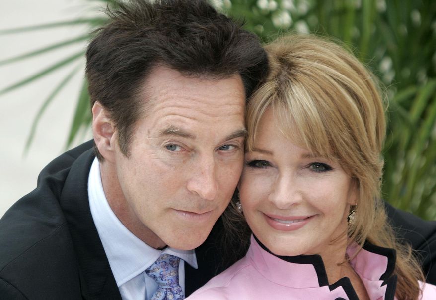 Actors Drake Hogestyn, left, and Deidre Hall, from the daytime series "Days of Our Lives," pose during the 48th Monte Carlo television festival in Monaco on June 10, 2008. Hogestyn, who played John Black for nearly four decades, has died from pancreatic cancer at age 70. (AP Photo/Lionel Cironneau, File)