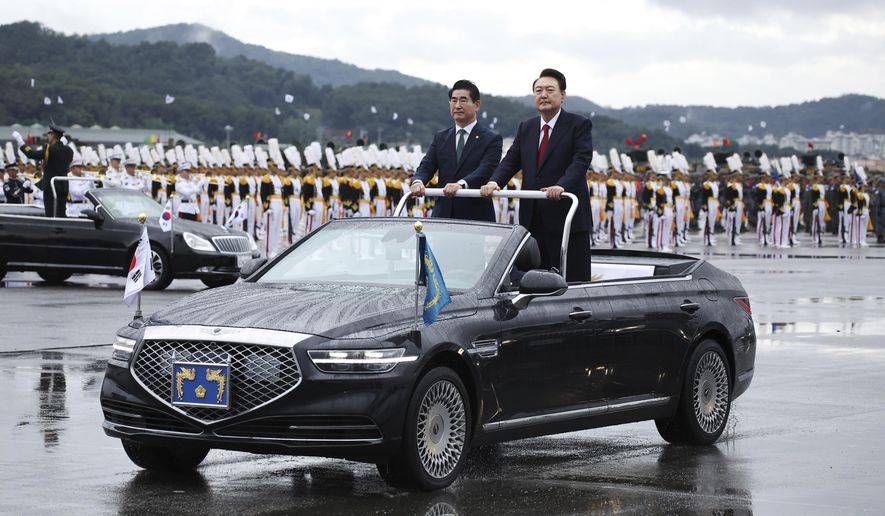 South Korean President Yoon Suk Yeol, right, inspects South Korean troops during a celebration to mark the 76th anniversary of Korea Armed Forces Day in Seongnam, South Korea Tuesday, Oct. 1, 2024. (Kim Hong-Ji/Pool Photo via AP) ** FILE **