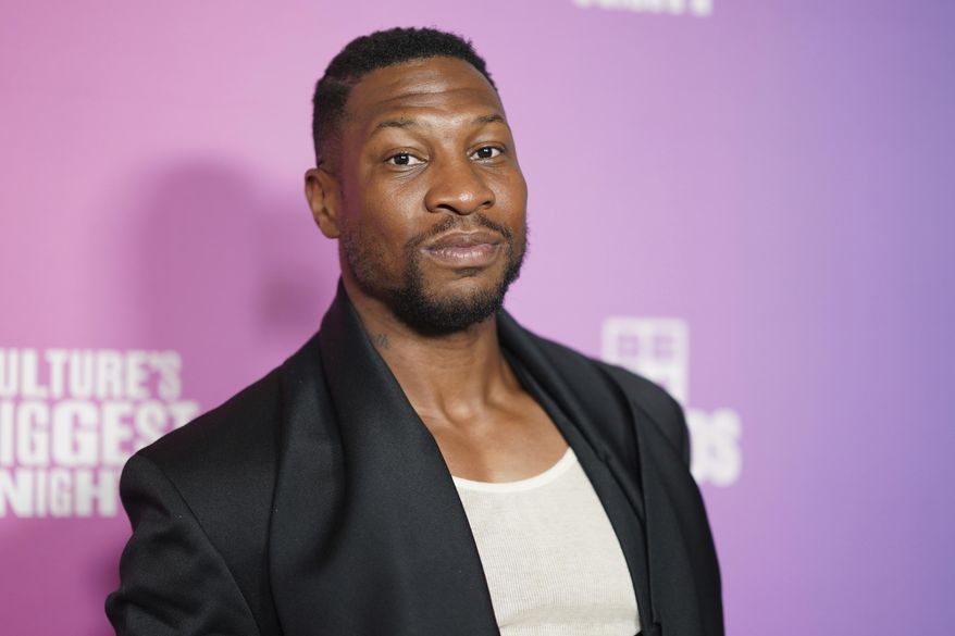 Jonathan Majors poses in the press room during the BET Awards at the Peacock Theater in Los Angeles, June 30, 2024. (Photo by Jordan Strauss/Invision/AP, File)