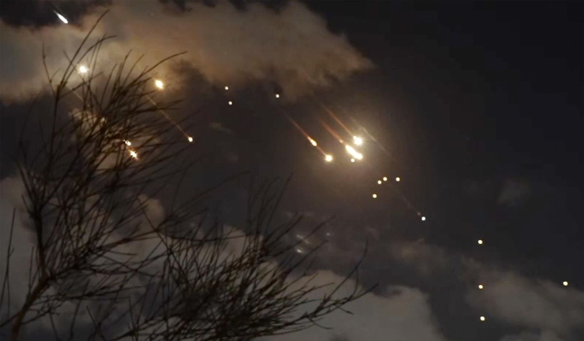 NextImg:Iran and Israel exchange threats following Tehran’s missile barrage