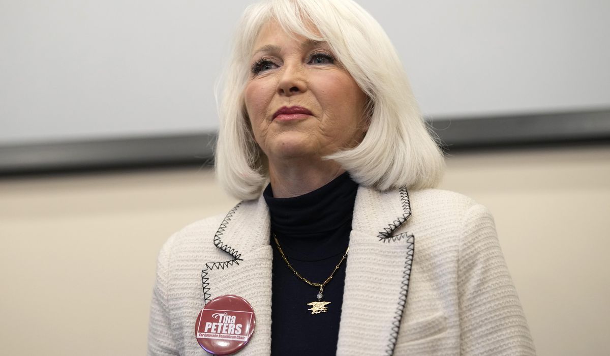 NextImg:Former Colorado county clerk Tina Peters sentenced to 9 years for voting data scheme