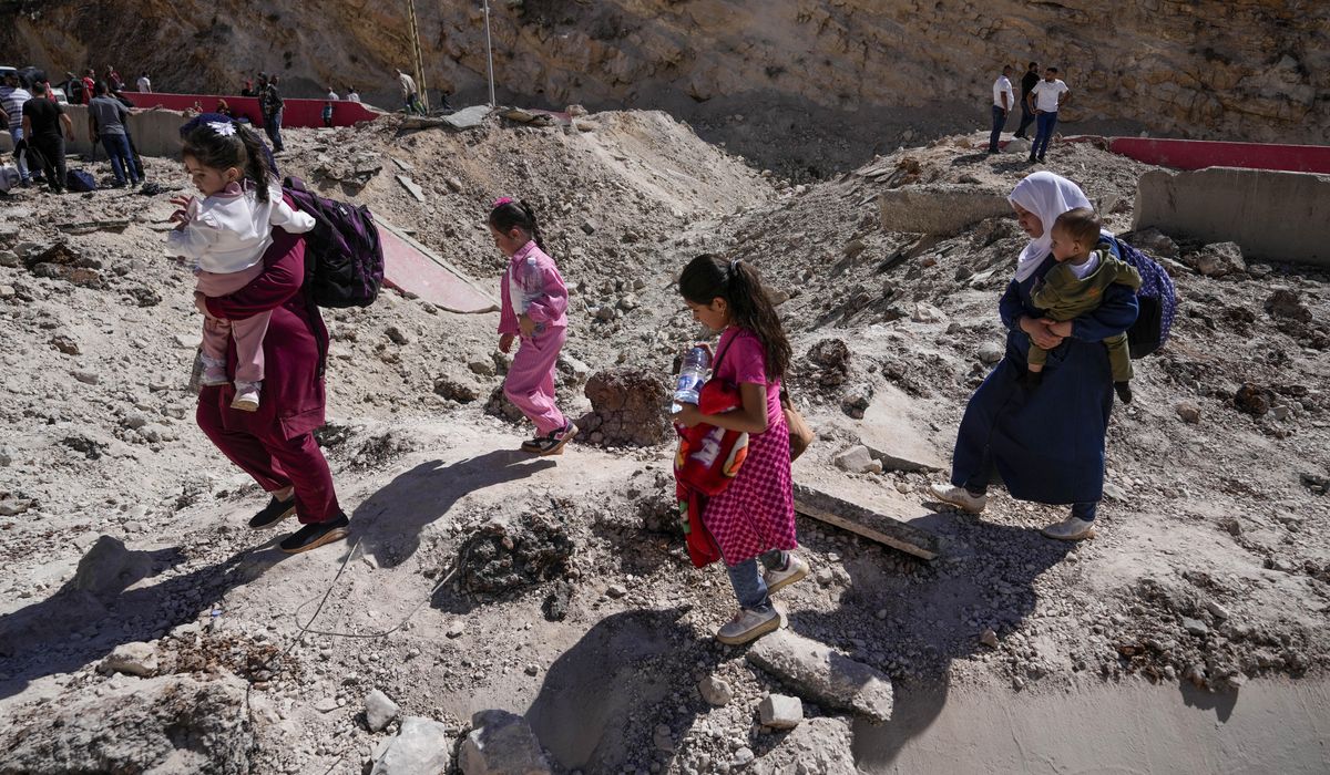 NextImg:Israel expands its bombardment in Lebanon as tens of thousands flee