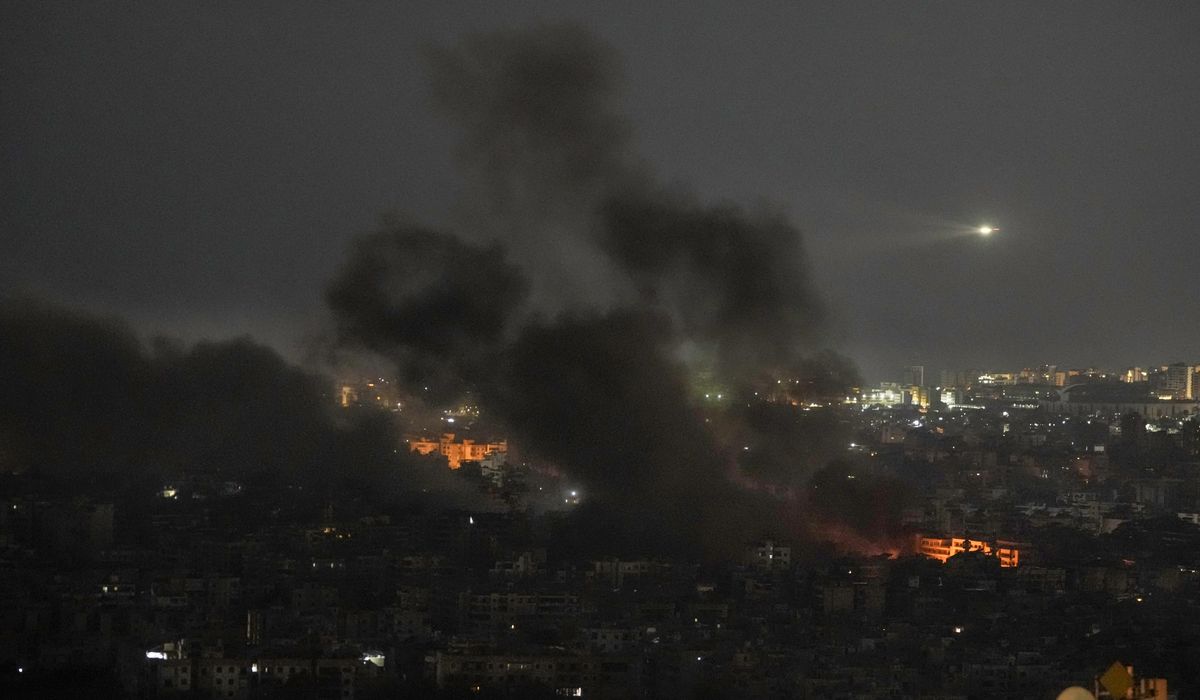 NextImg:Israel strikes Lebanon, hitting Beirut southern suburbs and the north