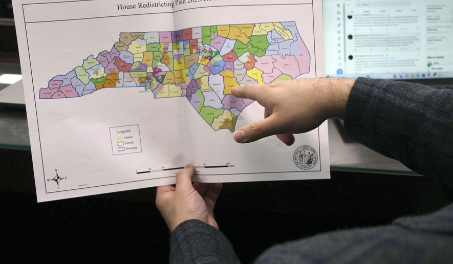 FILE - The North Carolina state House reviews copies of a map proposal for new state House districts during a committee hearing at the Legislative Office Building in Raleigh, N.C., Thursday, Oct. 19, 2023. (AP Photo/Hannah Schoenbaum, File)