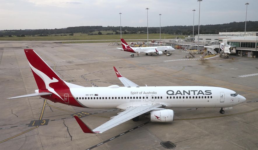 A Qantas jet arrives at Melbourne's Tullamarine Airport in Melbourne, Australia, Dec. 12, 2023. (AP Photo/Mark Baker, File)