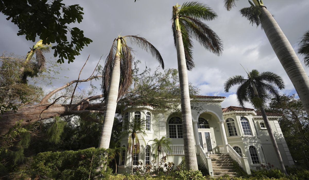 NextImg:Residents repair their homes and clean up after Hurricane Milton tore through Florida