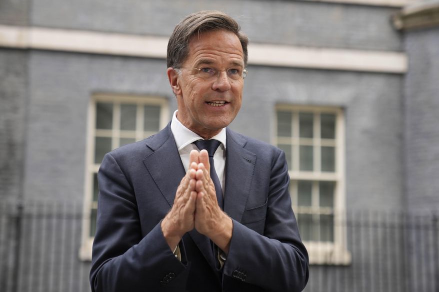 NATO Secretary General Mark Rutte speaks to the media after a meeting with Britain's Prime Minister Keir Starmer and Ukrainian President Volodymyr Zelenskyy at 10 Downing Street in London, Thursday, Oct. 10, 2024.(AP Photo/Kin Cheung)