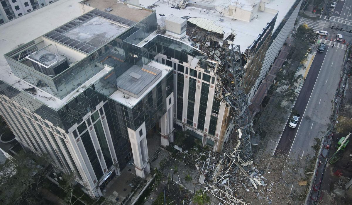 NextImg:Hurricane Milton blows crane into Florida office building