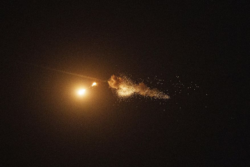 Ukrainian air defenses intercept a Shahed drone during a Russia aerial attack on Kyiv, Ukraine, on Saturday, Sept. 7, 2024. (AP Photo/Evgeniy Maloletka, File)