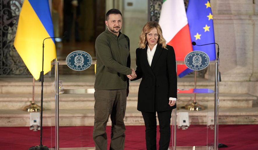 Italian Premier Giorgia Meloni, right, and Ukrainian President Volodymyr Zelenskyy pose for photographers after the press conference, at Villa Pamphilj, in Rome, Thursday, Oct. 10, 2024. (AP Photo/Andrew Medichini)