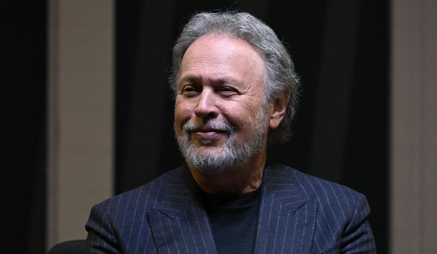 Comedian Billy Crystal attends a ceremony at the Basketball Hall of Fame, Sunday, Oct. 13, 2024, in Springfield, Mass. Crystal, actor Jack Nicholson, film director Spike Lee and businessman Alan Horwitz are being added to the Naismith Memorial Basketball Hall of Fame's James F. Goldstein SuperFan Gallery. (AP Photo/Jessica Hill)