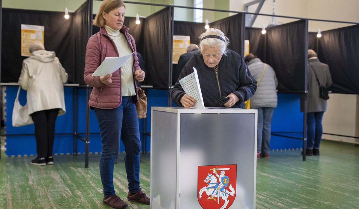NextImg:Lithuanians vote in parliamentary election with many looking for change despite a strong economy