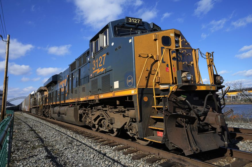 A CSX freight train sits on a siding in downtown Pittsburgh, Nov. 19, 2022. (AP Photo/Gene J. Puskar, File)