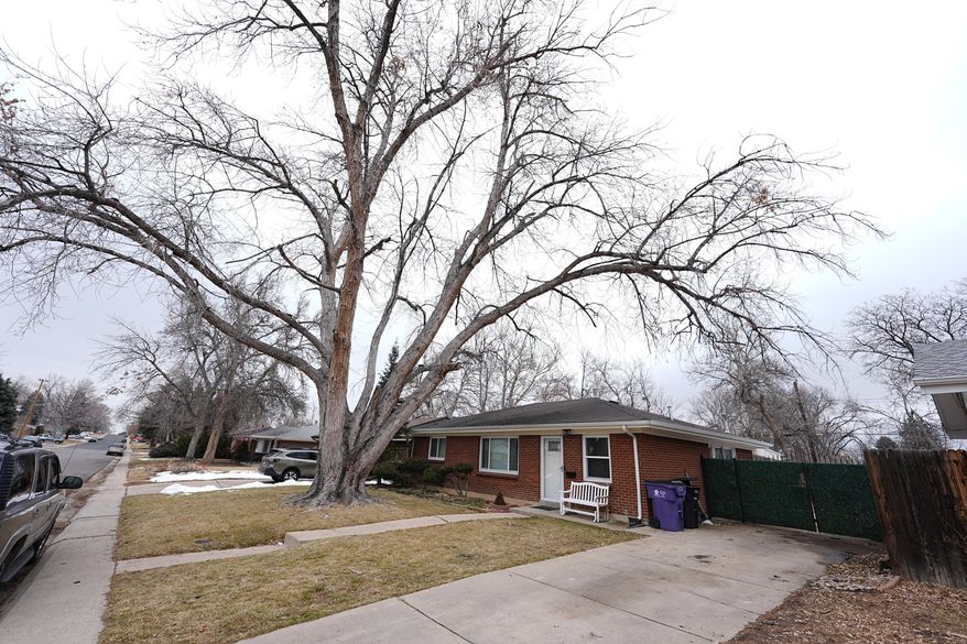 FILE - The residence where a former funeral home owner kept a deceased women's body in a hearse for over a year as well as the remains of over 30 cremated people is shown Feb. 16, 2024, in southwest Denver. (AP Photo/David Zalubowski, File)