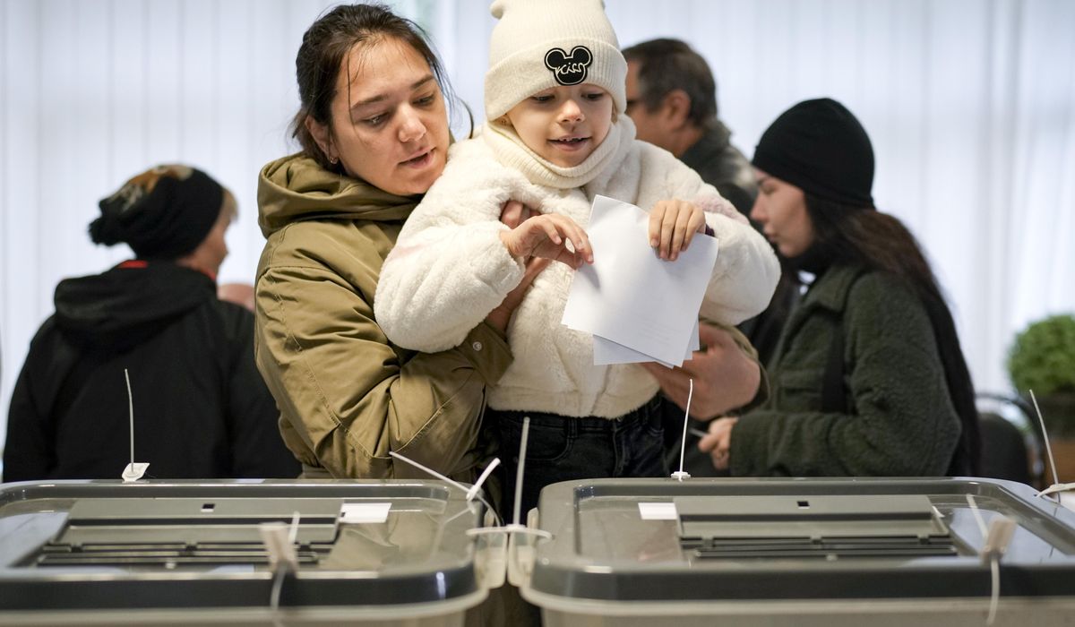 NextImg:Moldovans cast votes to choose president and decide on EU path as Russian interference claims spike