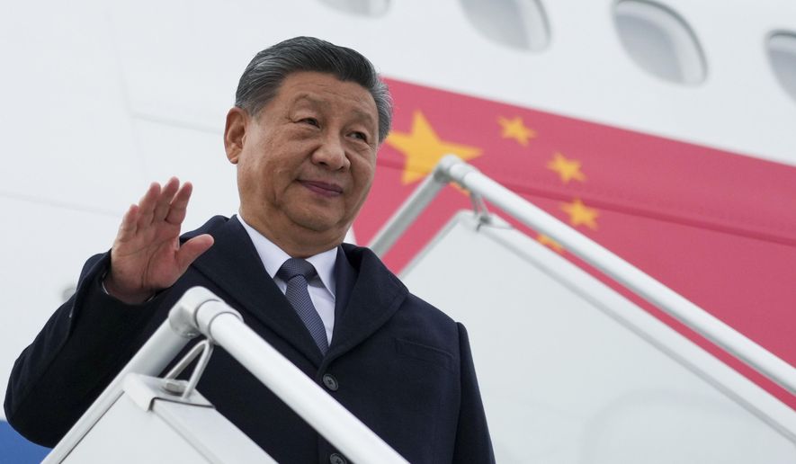 Chinese President Xi Jinping arrives at Kazan International Airport, prior to the BRICS Summit in Kazan, Russia, Tuesday, Oct. 22, 2024. (Alexander Vilf/Photo host brics-russia2024.ru via AP)