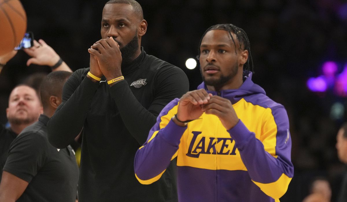 NextImg:LeBron, Bronny James make history as the NBA’s first father-son duo to play together